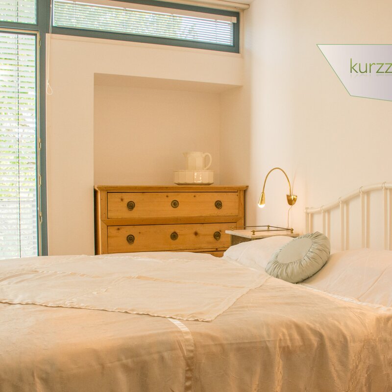 Doublebed,door to the balcony