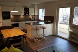 living area with access to the spacious balcony