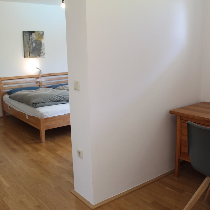 Master bedroom with work space and large bathroom