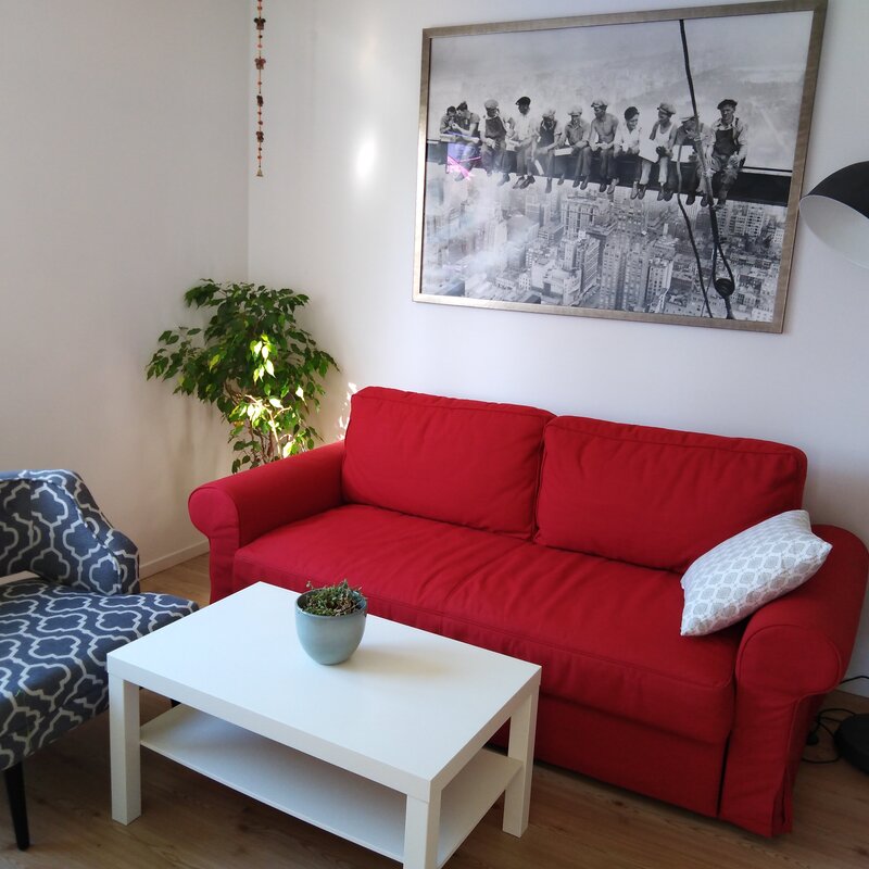 Wohnzimmer mit Schlafsofa