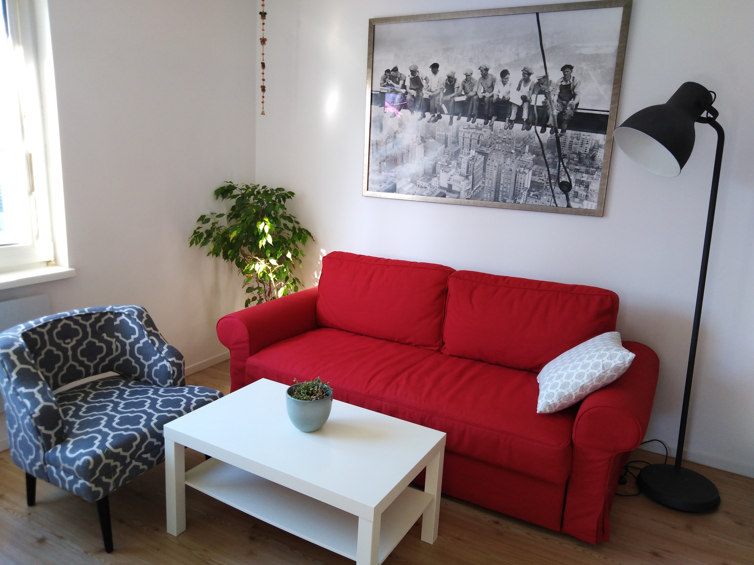 Wohnzimmer mit Schlafsofa