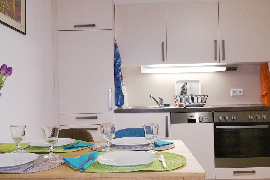 Living room - dining table and kitchen