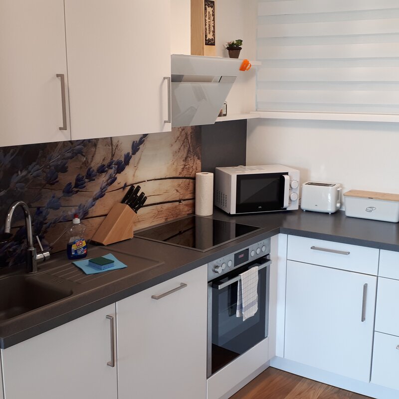 fully equipped with all dishes and kitchen appliances