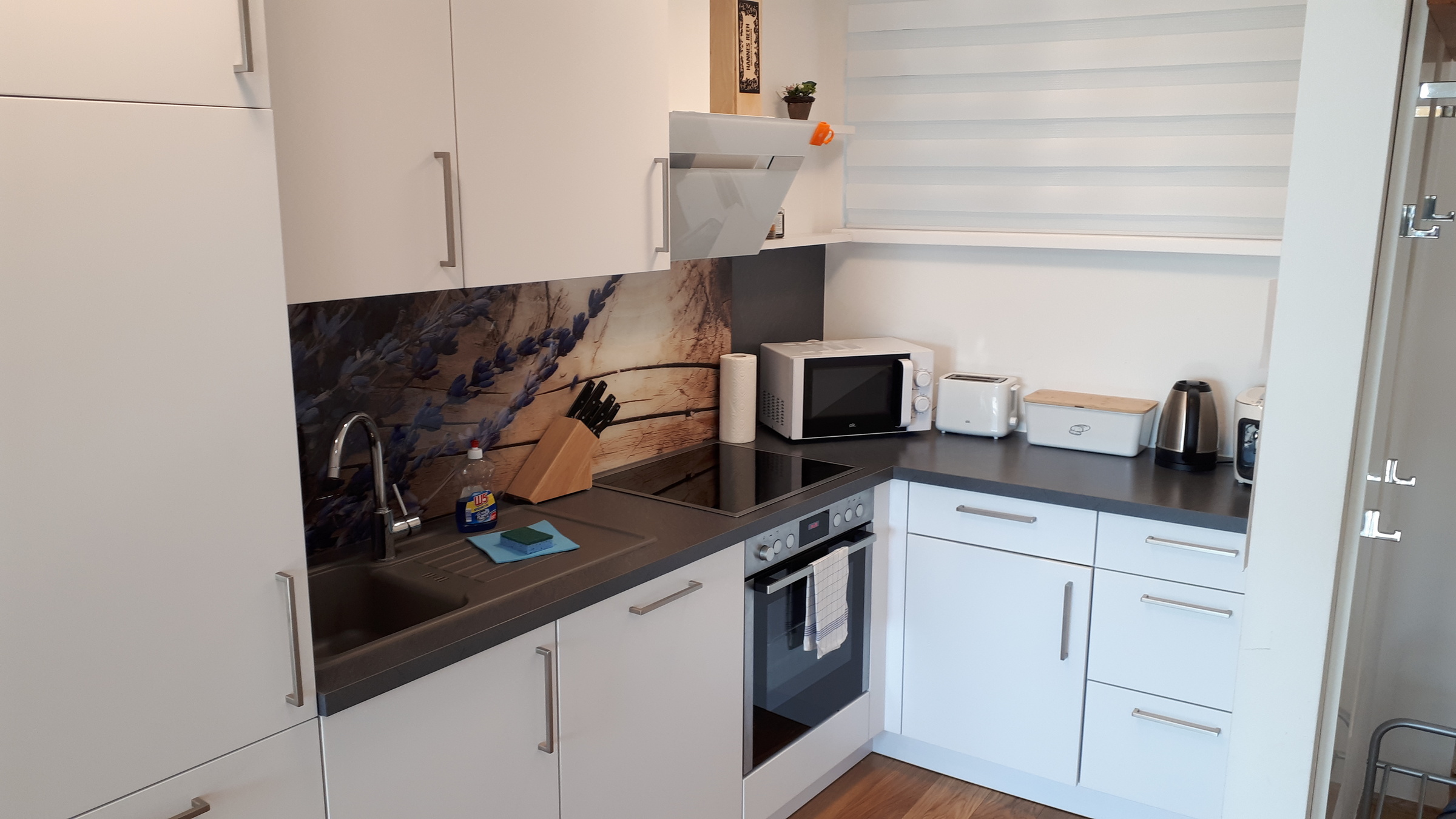 fully equipped with all dishes and kitchen appliances