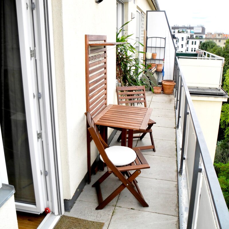 balcony with dining table and chairs | © Tillbert Strahl