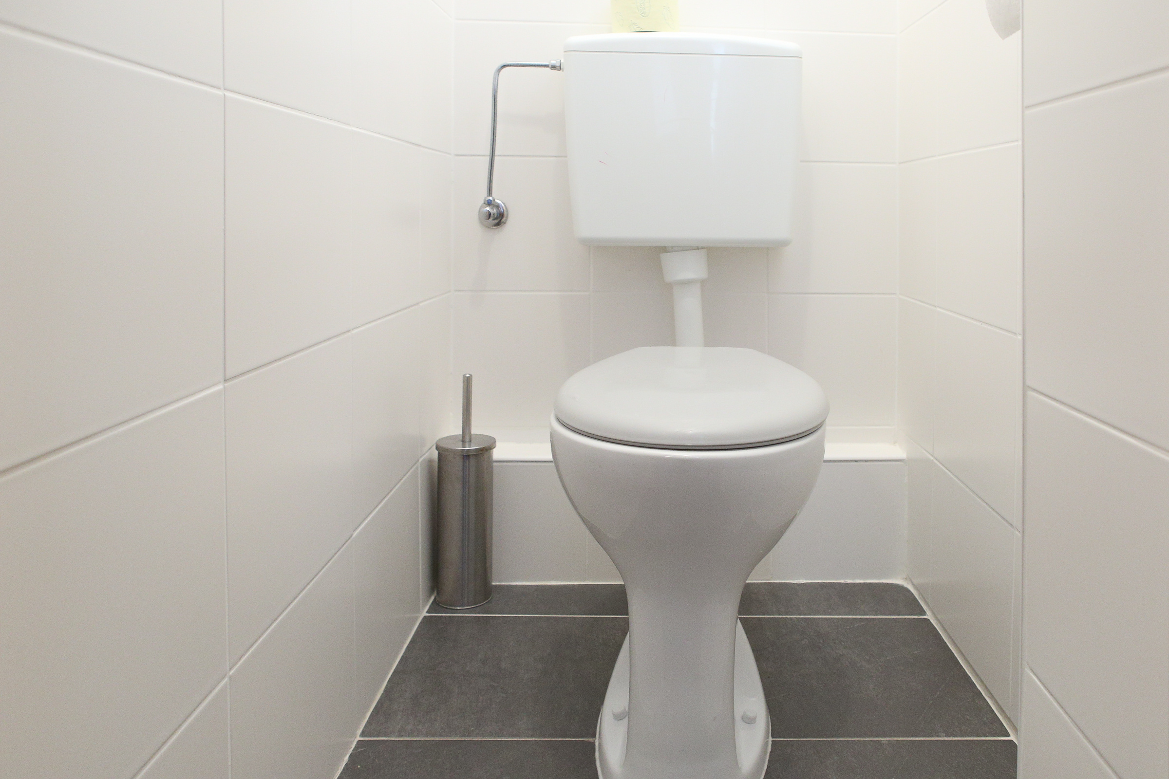 separated from the bathroom