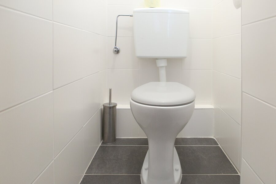 separated from the bathroom